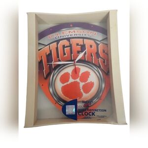 Show off your love for Clemson Tigers with this 13" wall clock from WinCraft. Pe